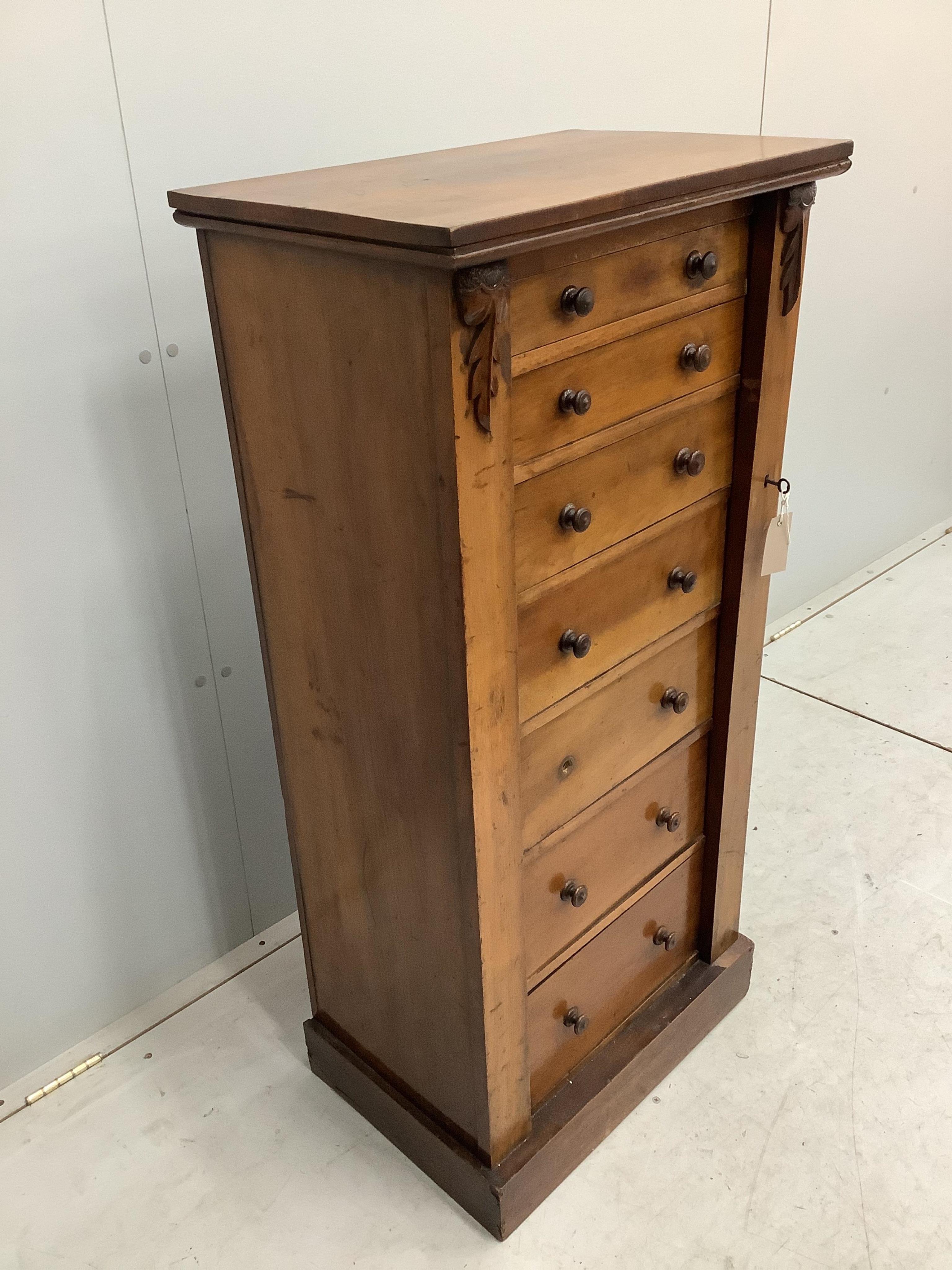 A Victorian walnut Wellington chest, width 54cm, depth 36cm, height 112cm. Condition - fair